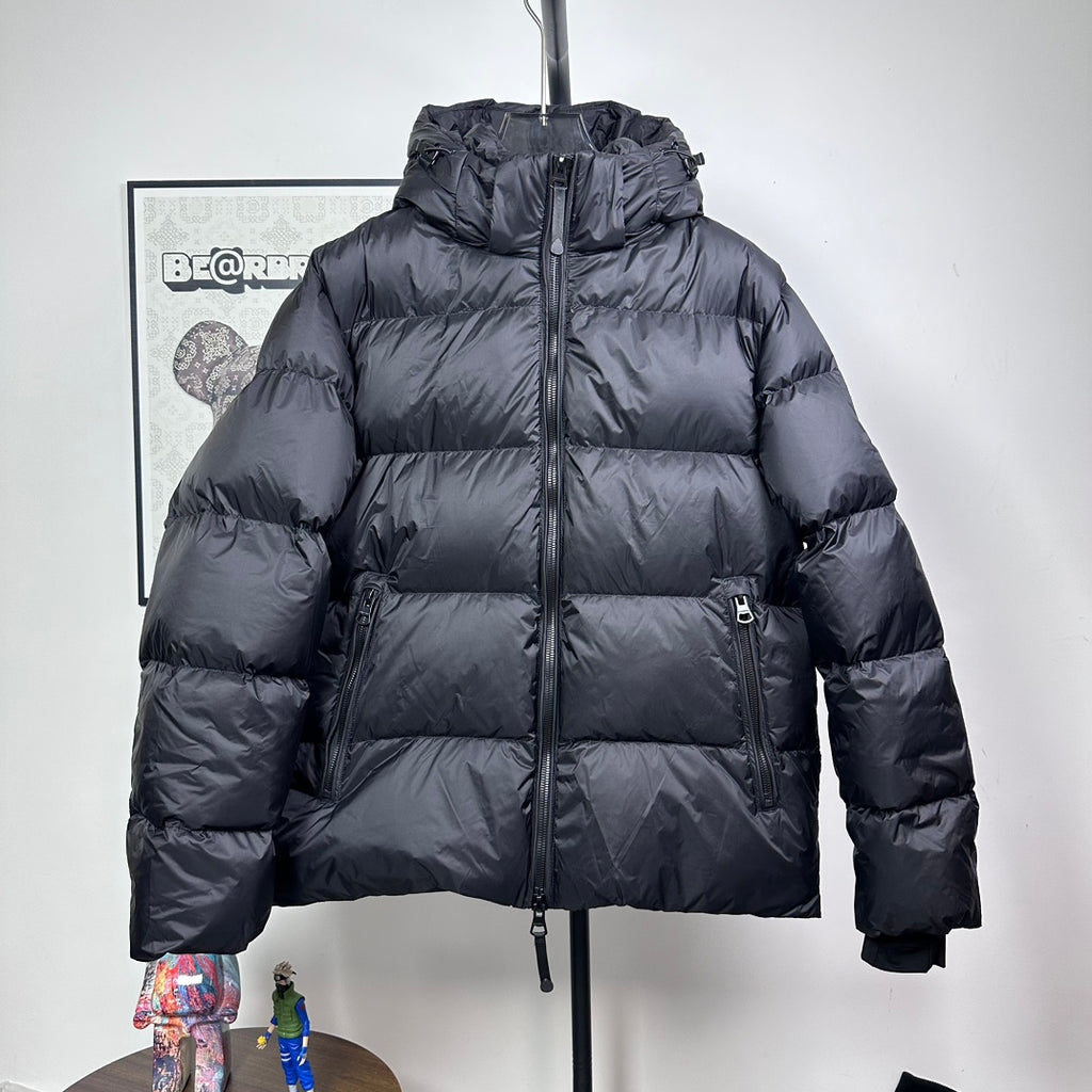 Long hooded puffer jacket, dark color, full-zip front with ribbed cuffs