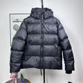 Long hooded puffer jacket, dark color, full-zip front with ribbed cuffs