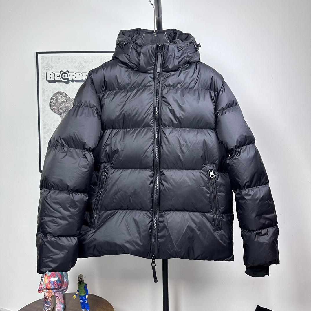 Long hooded puffer jacket, dark color, full-zip front with ribbed cuffs