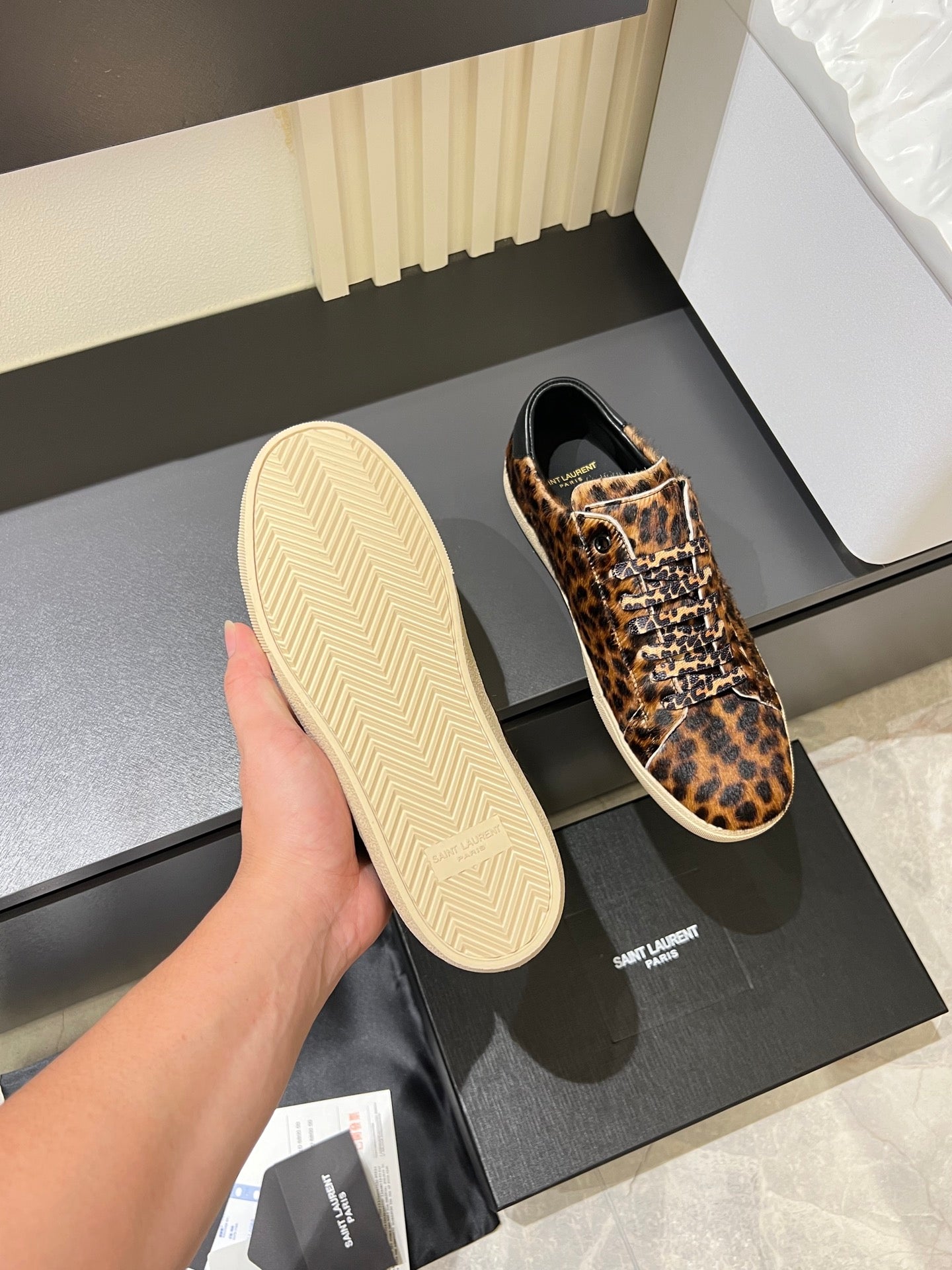 YSL leopard-print sneakers, outsole view with white rubber tread