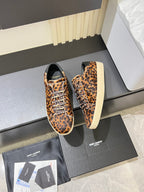 YSL leopard-print low-top sneakers pair view, lace-up front and side