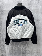 Black-and-white quilted jacket with back graphic, logo patch, and ribbed collar