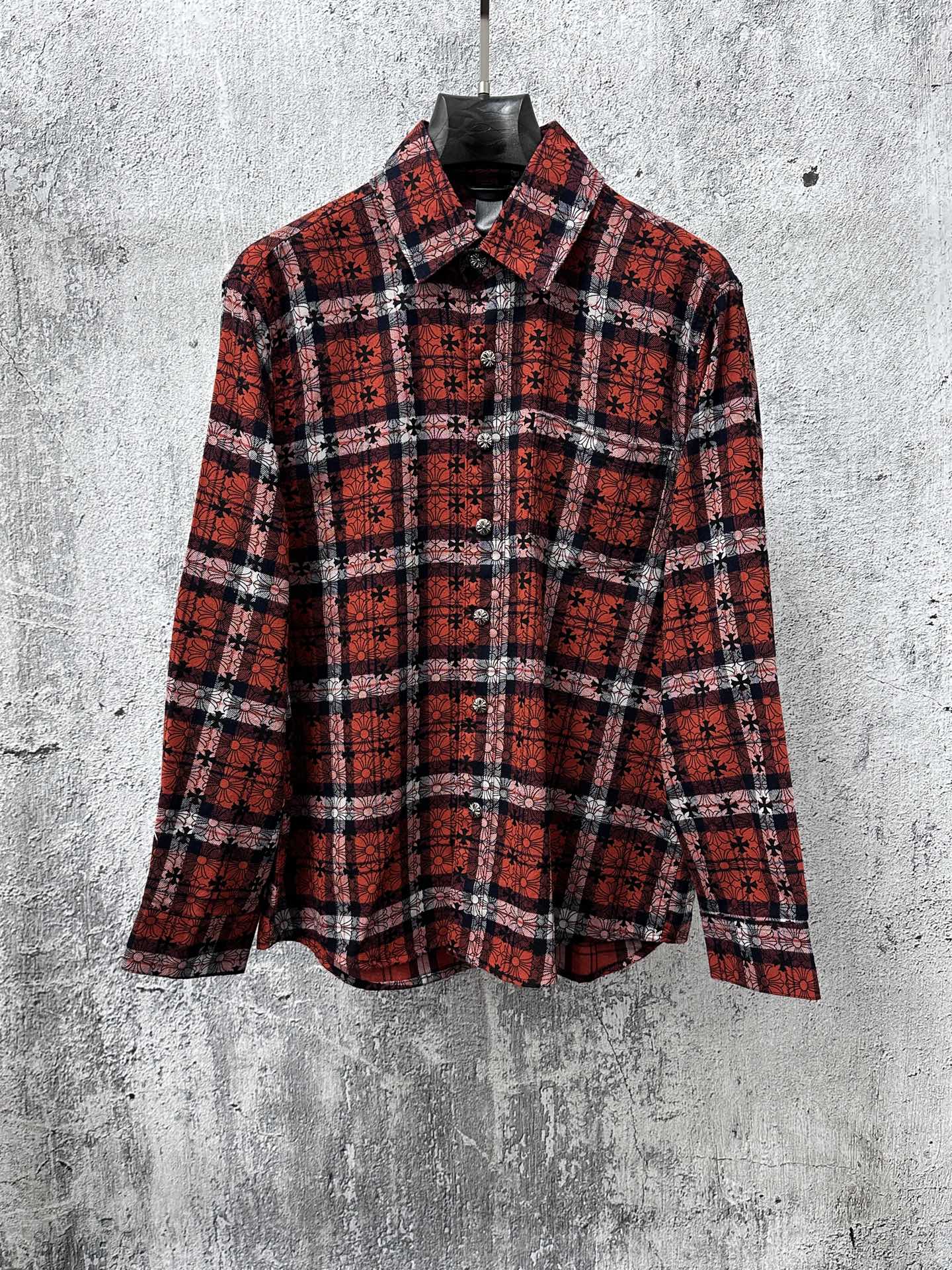 Red and navy plaid long-sleeve button-up shirt with collar and chest pocket
