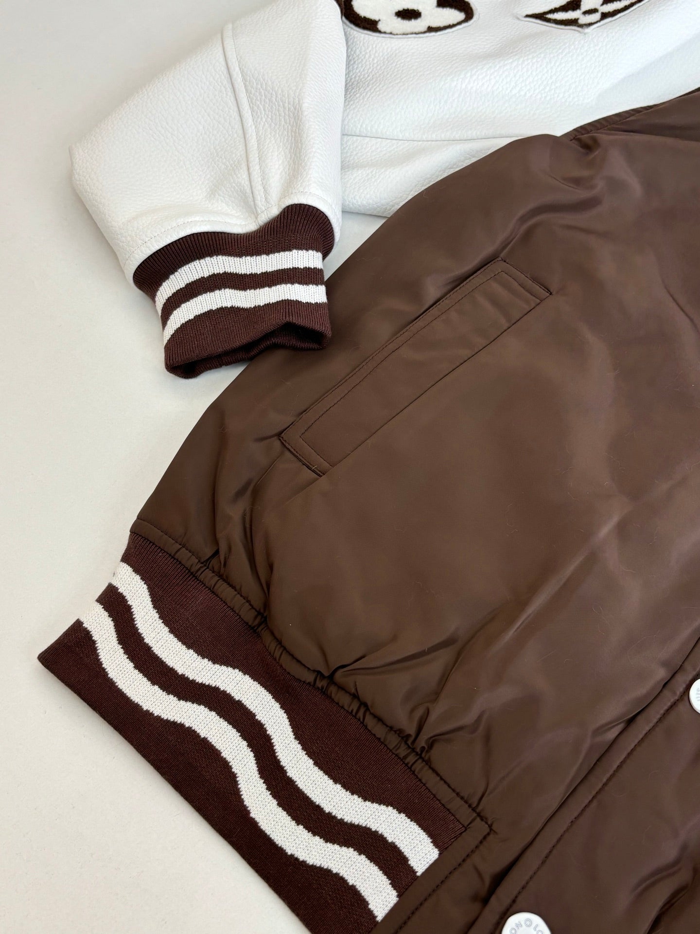 Louis Vuitton long jacket sleeve and front hem with brown fabric and striped ribbed cuff