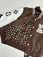 Louis Vuitton long jacket angled view with brown front, white stripes, and multicolor lining