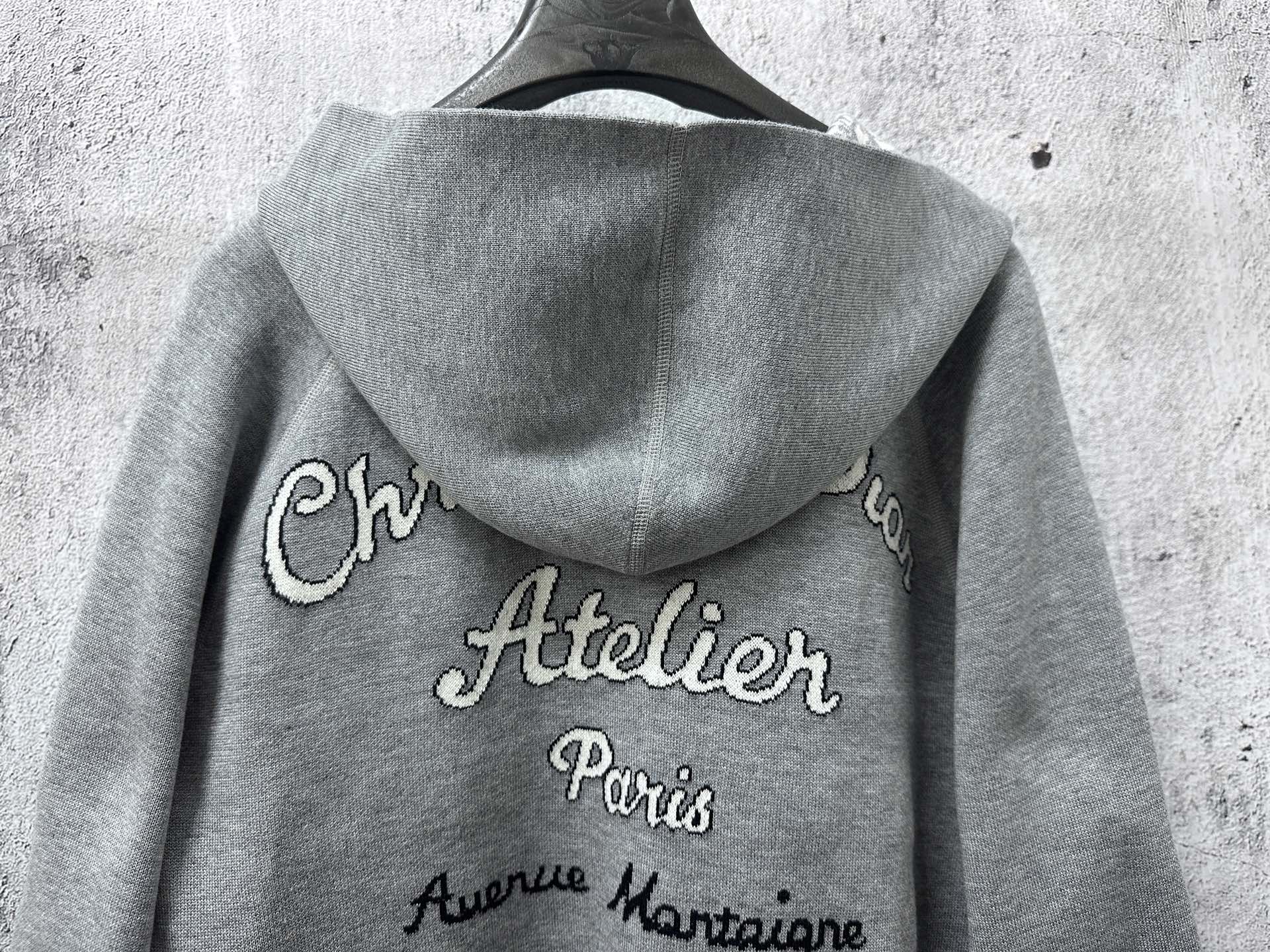 Gray hoodie with back print “Atelier Paris” and hood drape