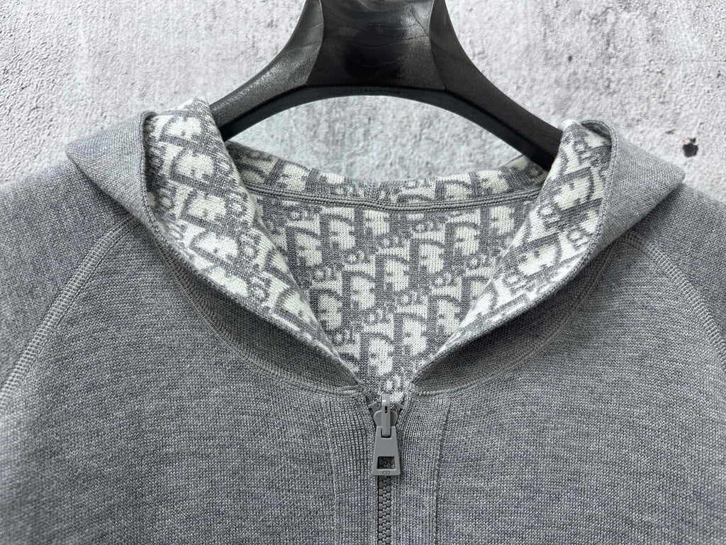 Gray hoodie close-up of hood lining with Dior-style repeating pattern