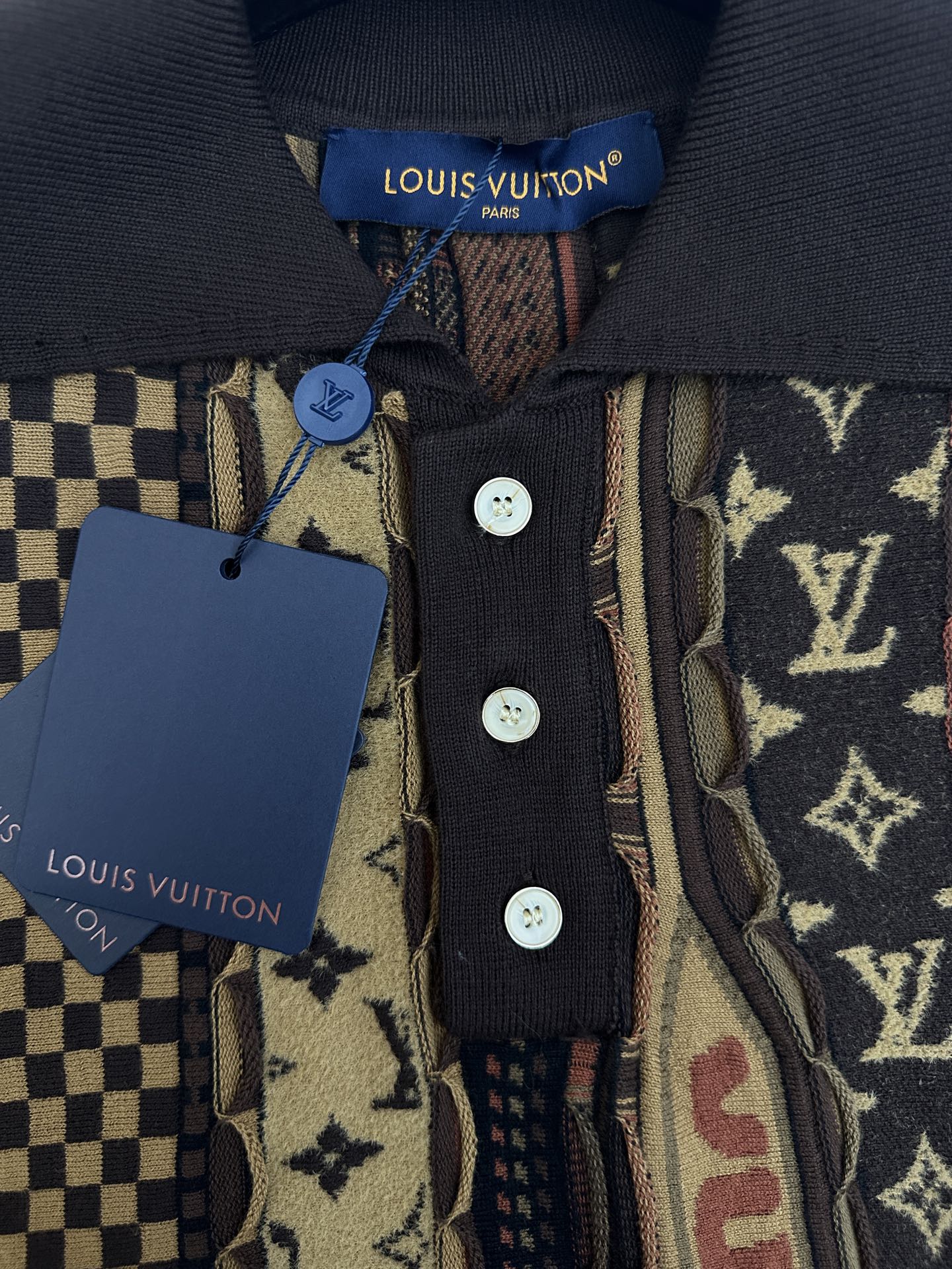 Short-sleeve button-up collar with Louis Vuitton tag and four-button front placket