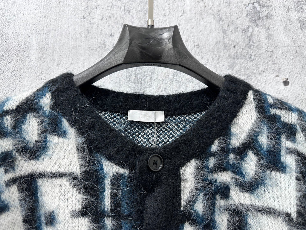 Dior long sweater neckline close-up with black buttons and blue/white pattern