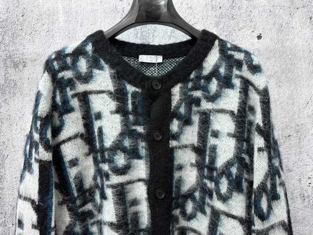 Dior long button-front sweater upper front view, blue and white abstract motif