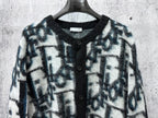 Dior long button-front sweater upper front view, blue and white abstract motif