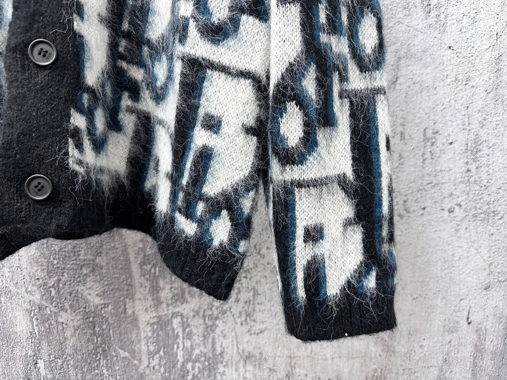 Dior long sweater lower front with black buttons and blue/white abstract print