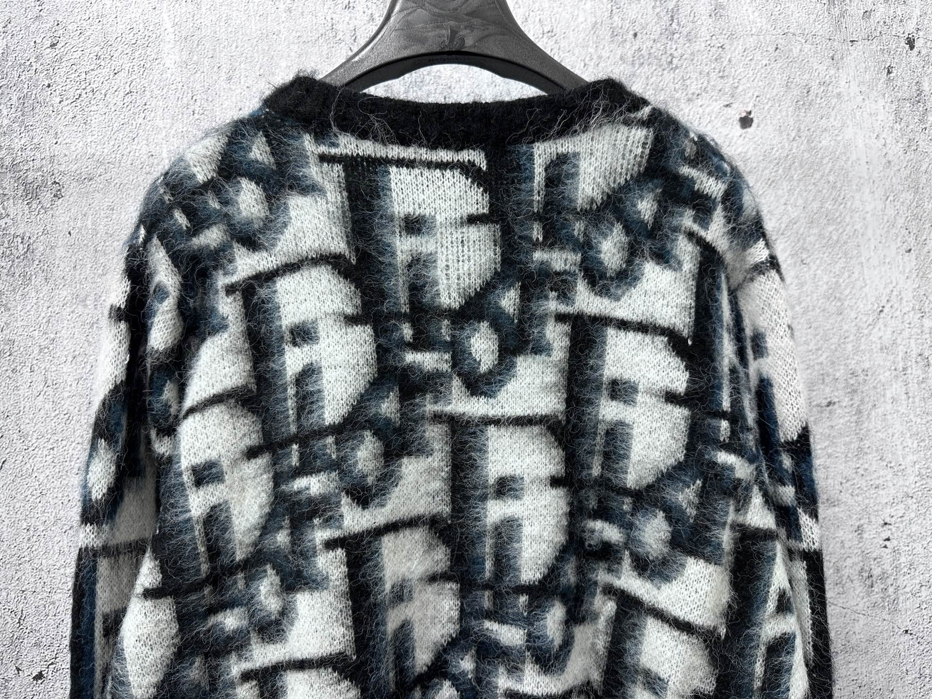 Dior long sweater upper section with blue and white abstract pattern