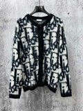 Dior long button-front sweater with blue and white abstract pattern, black collar