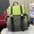 Gucci backpack with lime green flap, dark trim, and adjustable shoulder straps