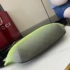 Gucci lime green belt bag side view with pebble-grain leather texture