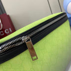 Gucci belt bag zip close-up with black trim and metal pull tab