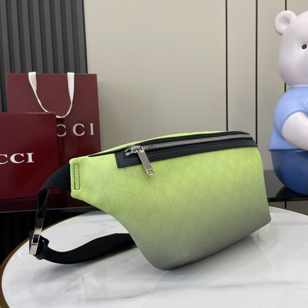 Gucci lime green belt bag with black zipper and adjustable crossbody strap
