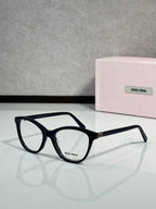 MiuMiu eyeglasses with black round-rectangular frames and clear lenses