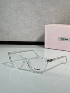 MiuMiu eyeglasses with transparent acetate frames and clear lenses