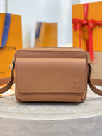 Tan leather Louis Vuitton crossbody bag with front flap and silver-tone hardware