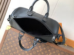 Dark blue leather men's bag with top zipper, front straps, and shoulder strap