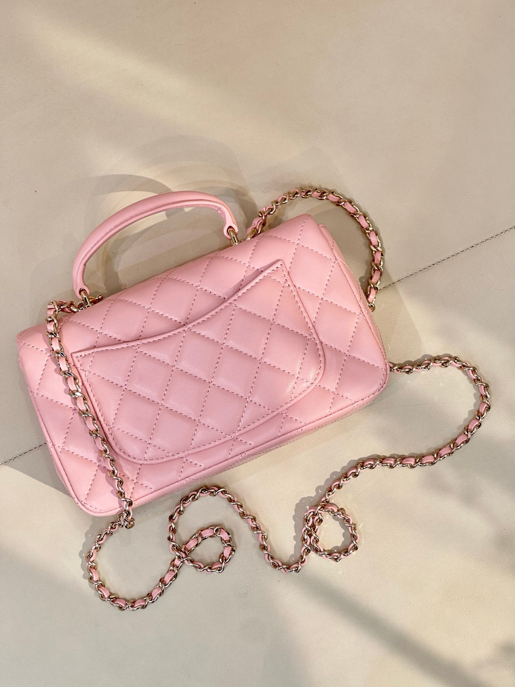 Chanel pink quilted flap shoulder bag with chain strap and metal CC logo