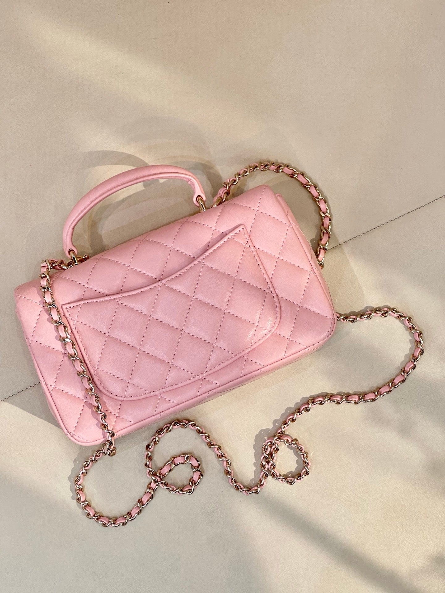Chanel pink quilted flap shoulder bag with chain strap and metal CC logo