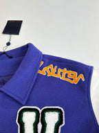 Blue jacket shoulder and sleeve panel with arched embroidered logo and green-outlined V