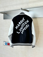 Louis Vuitton varsity jacket back, black with white lettering, striped ribbed hem.