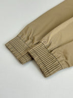 Beige long-sleeve jacket sleeve hem with ribbed elastic gathered cuff