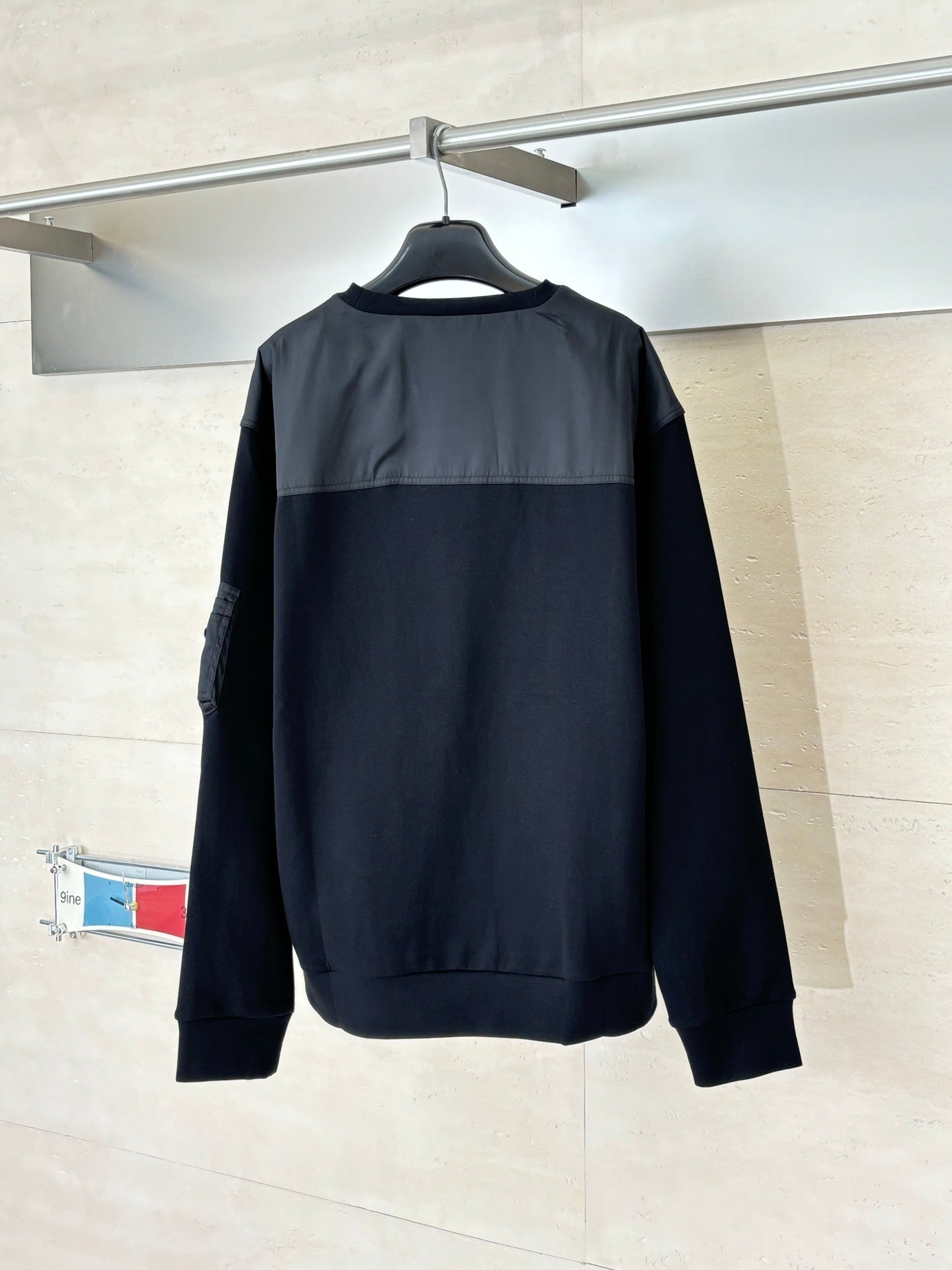 Prada long-sleeve sweatshirt, dark navy crewneck; solid back view