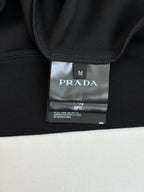 Prada size label on inner collar, dark navy sweatshirt
