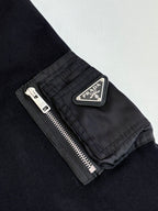 Prada logo patch on zipped sleeve pocket, dark navy sweatshirt