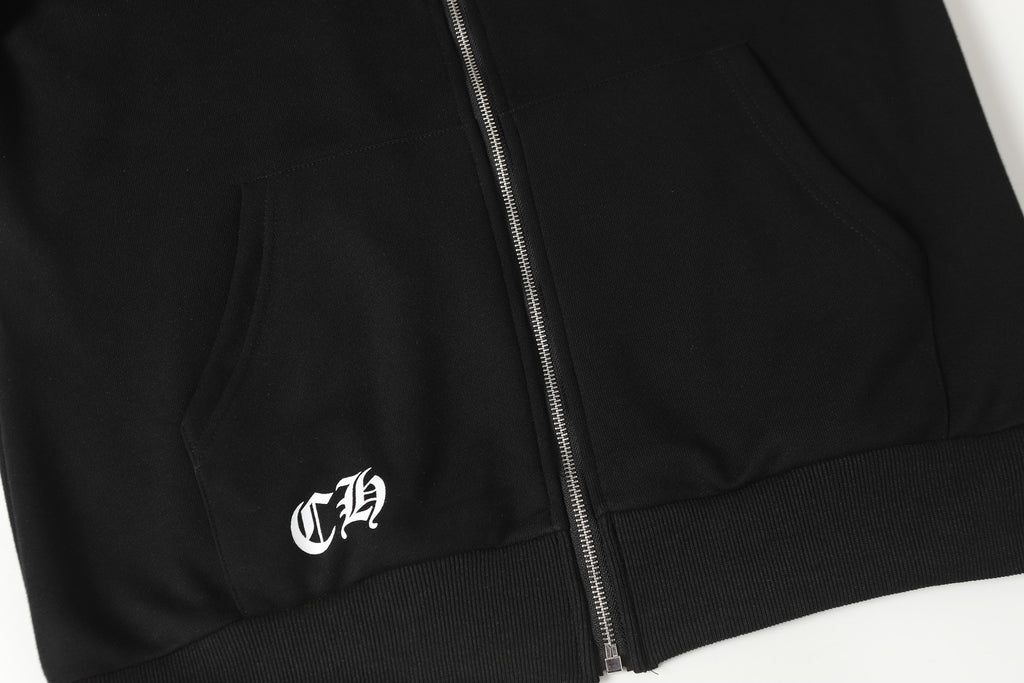 Black hoodie lower front zipper and hem with small white logo mark.