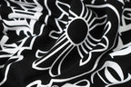 Black long-sleeve top with white floral graphic print