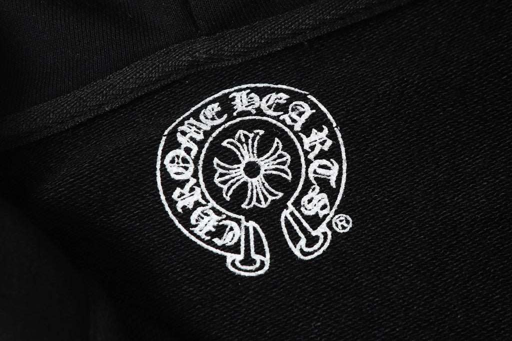 Black hoodie fabric with white circular crest logo print.