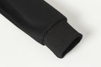 Black long-sleeve top sleeve hem with ribbed cuff