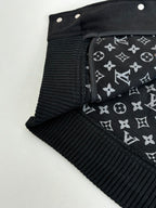 Louis Vuitton varsity jacket cuff and collar with black lining featuring repeating monogram pattern