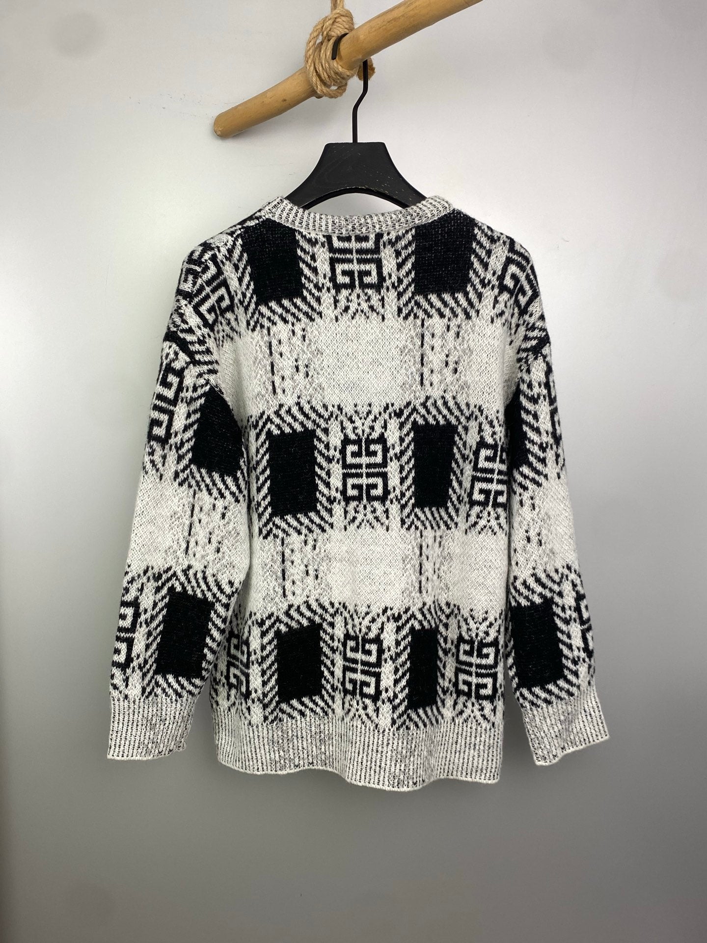 Givenchy knit sweater in black and white with geometric pattern, back view