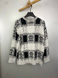 Givenchy knit sweater in black and white with geometric pattern, crew neckline