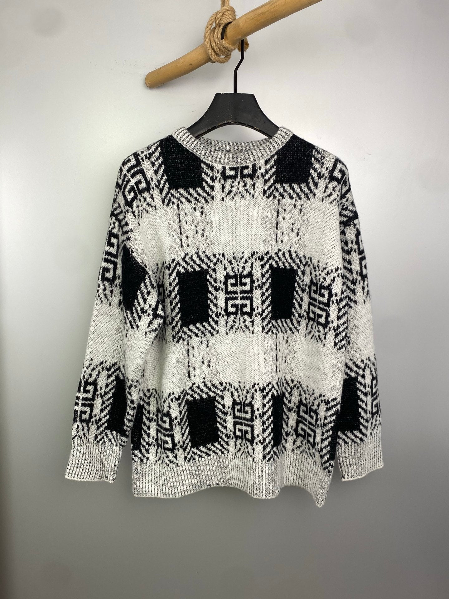 Givenchy knit sweater in black and white with geometric pattern, crew neckline