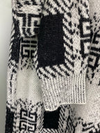 Givenchy knit sweater hem and sleeve with black-and-white geometric pattern knit