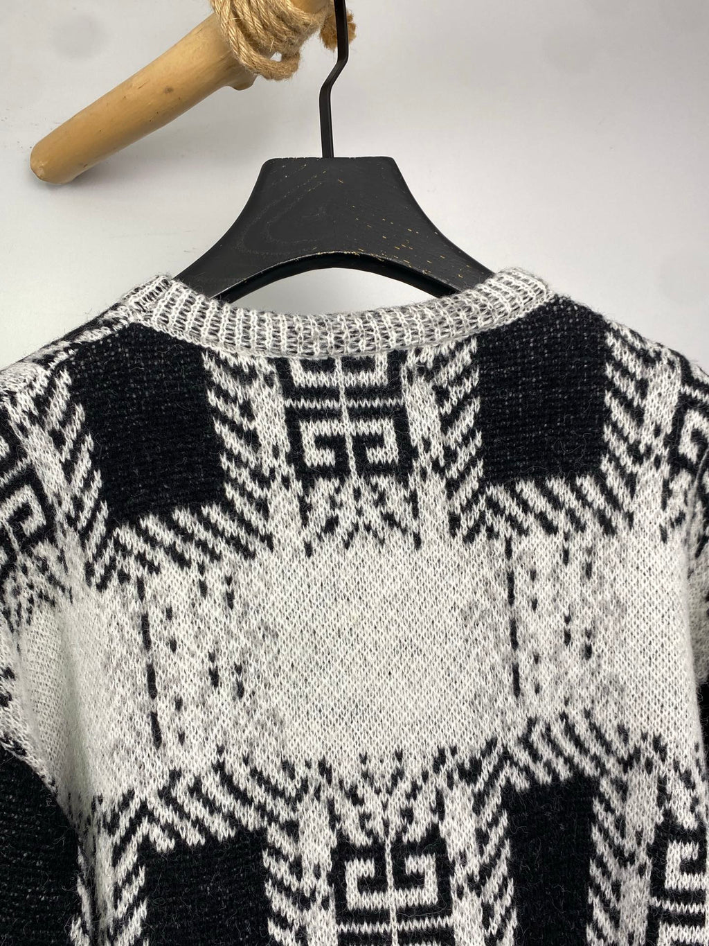 Givenchy knit sweater neckline and shoulders with black-and-white geometric motif