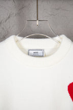 White ribbed crew-neck knit sweater with ami label at inner collar