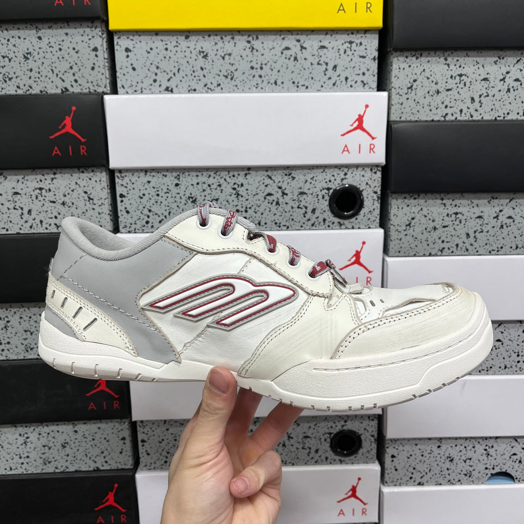 White Balenciaga low-top sneaker with red lace trim and side logo