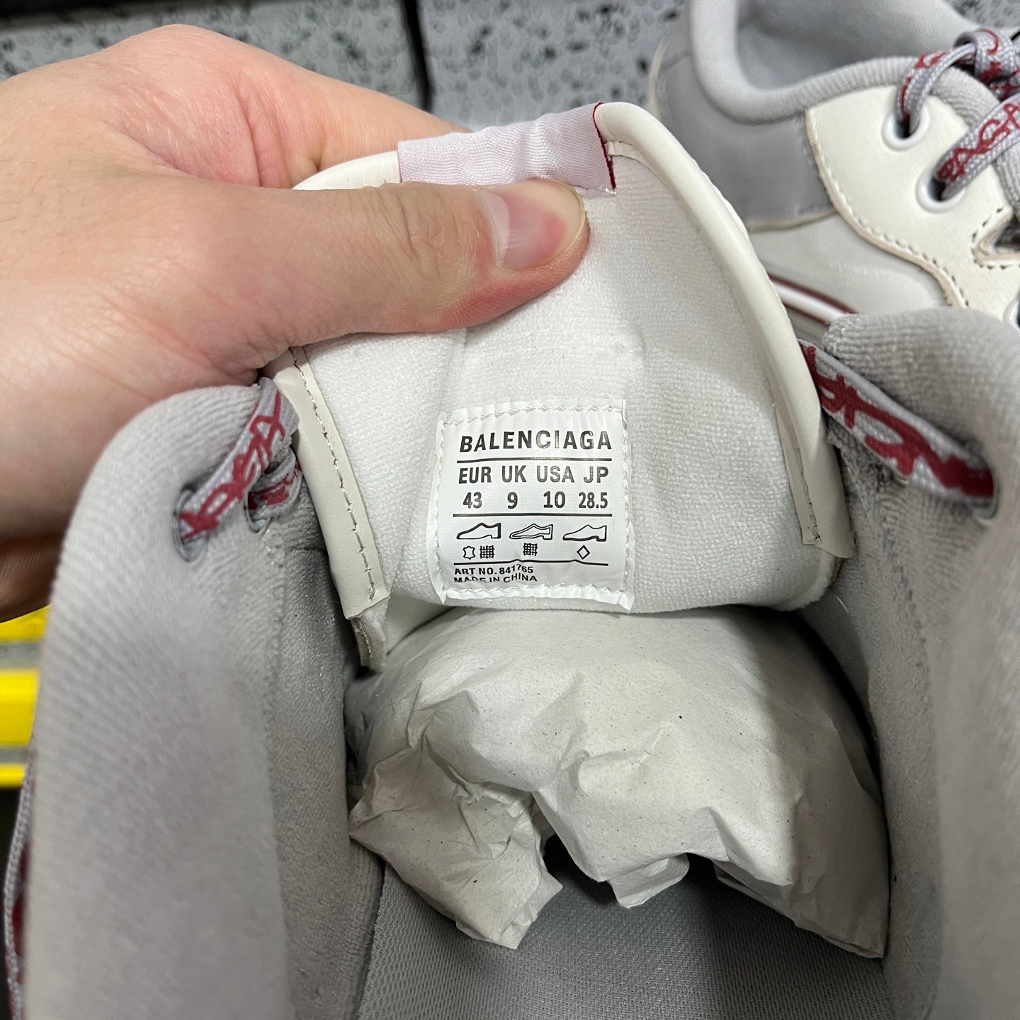Balenciaga sneakers tongue label with size info and care text