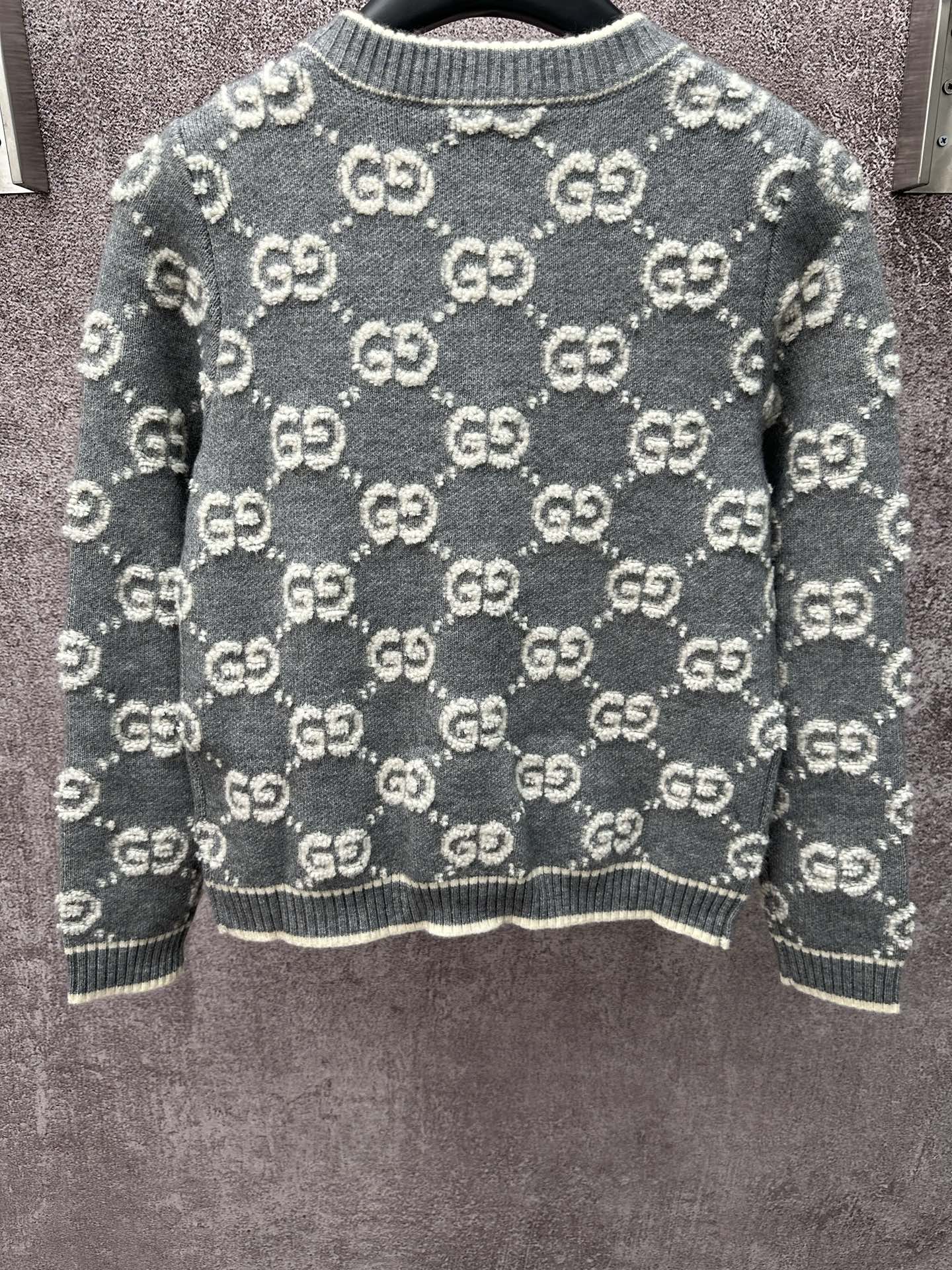 Gucci GG knit sweater, dark gray with repeat logo pattern and ribbed cuffs