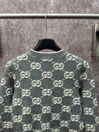 Dark green GG monogram knit cardigan back view with ribbed collar