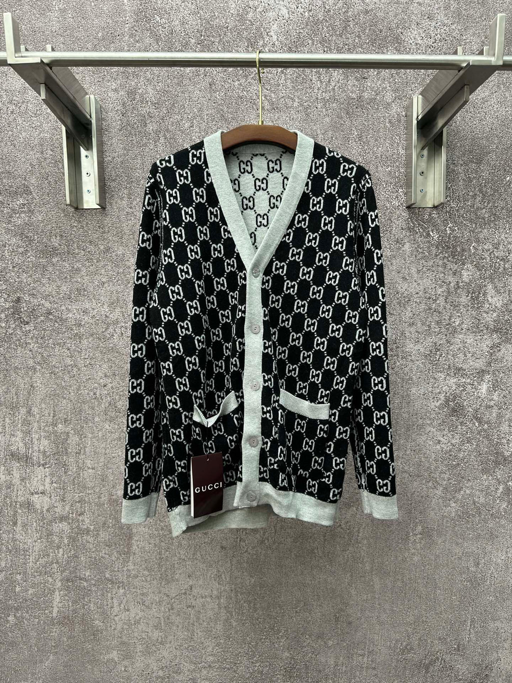 Gucci long-sleeve V-neck top with black GG monogram and light gray trim